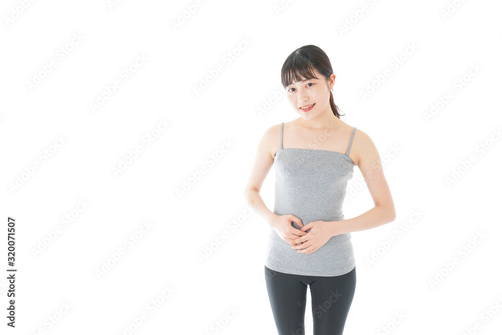 ダイエットをする若い女性 ダイエットをする若い女性