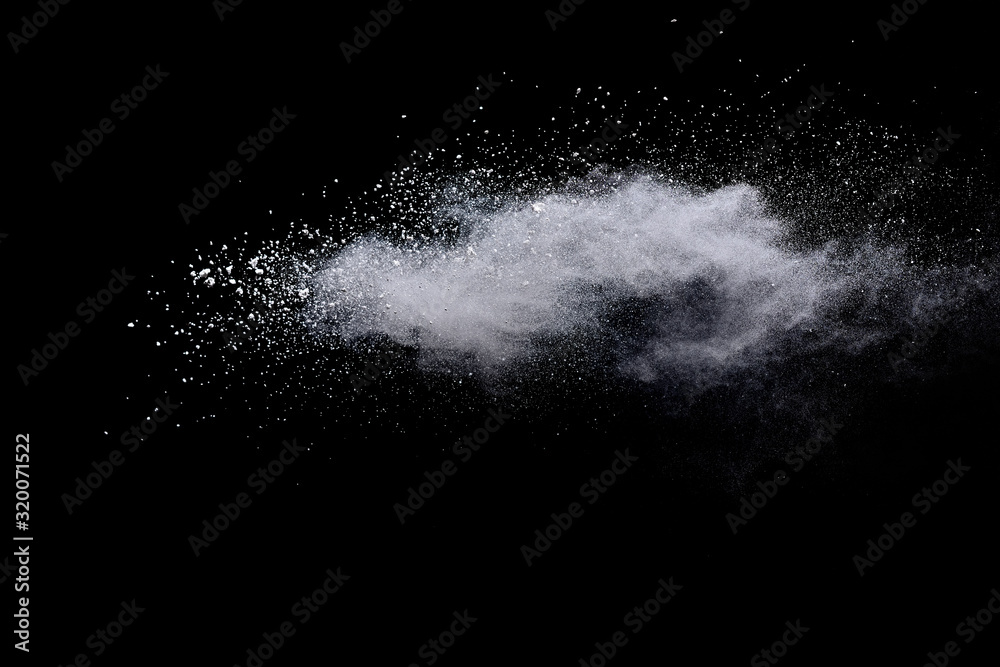 White powder explosion on black background. 