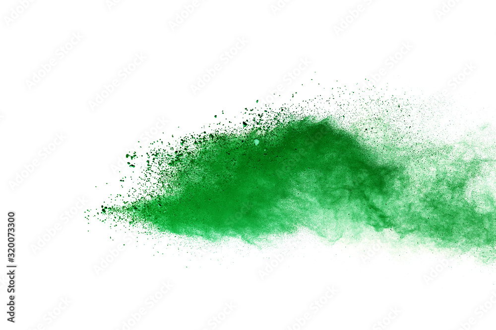 Obraz premium Green powder explosion on white background.