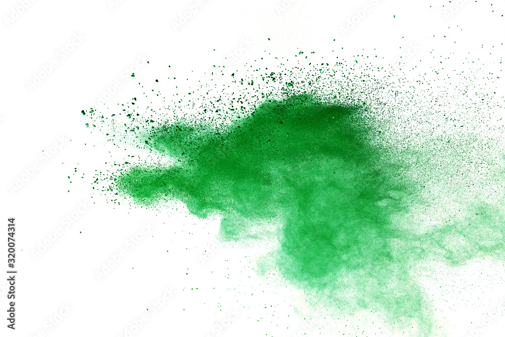 Obraz premium Green powder explosion on white background.