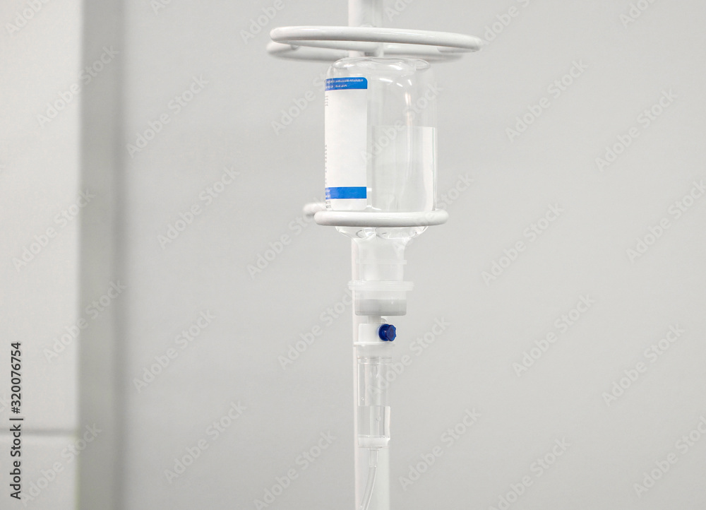 Close-up of the system with saline for intravenous injection. Antibiotic Close-up of the system with saline for intravenous injection. Antibiotic