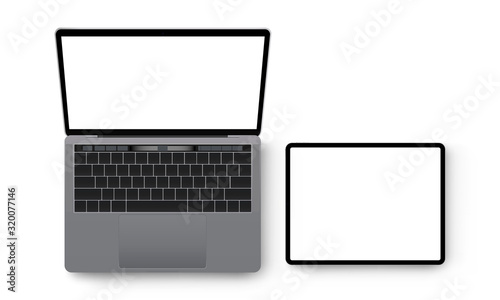 Laptop and tablet computer mockup, view from above. Vector illustration