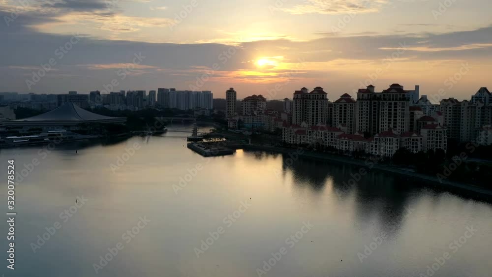 Nov 2019 4k video aerial of sunrise at Kallang lake over looking to Singapore sport hub Nov 2019 4k video aerial of sunrise at Kallang lake over looking to Singapore sport hub