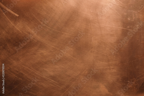 Copper background. There are scratches on the copper surface. photo