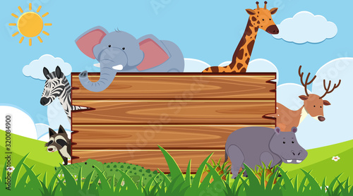 Wooden board with wild animals in background