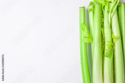 Fototapeta Naklejka Na Ścianę i Meble -  Green celery on white background