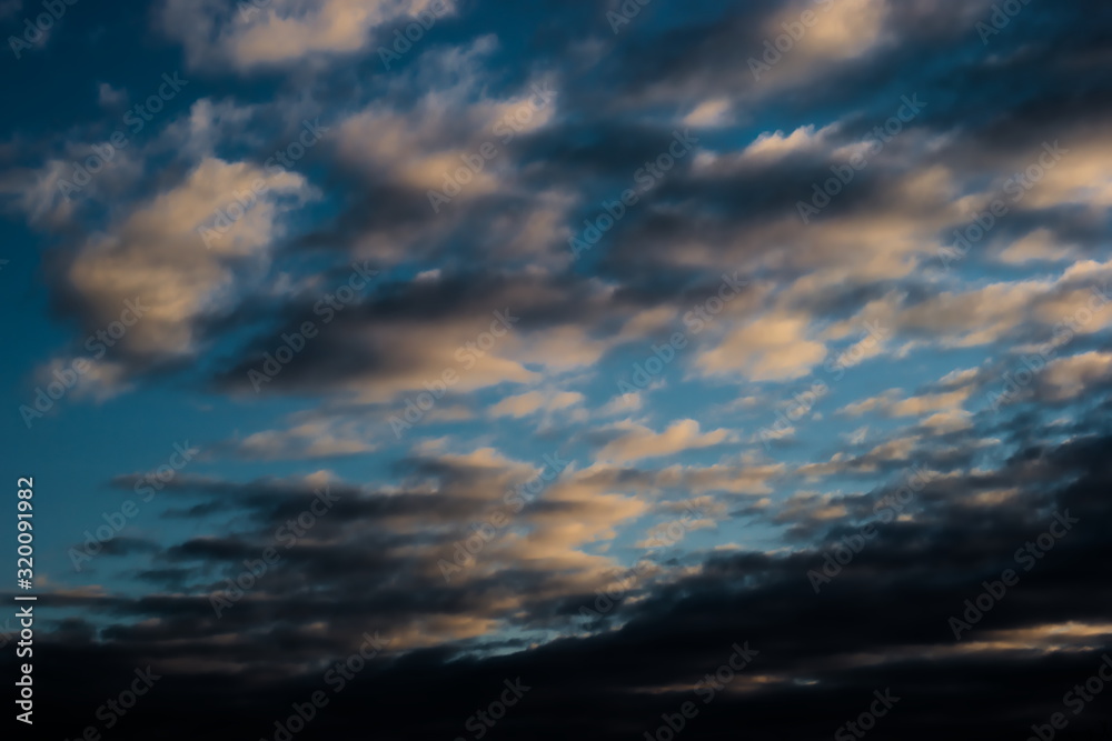 winter cloudy sky at sunset