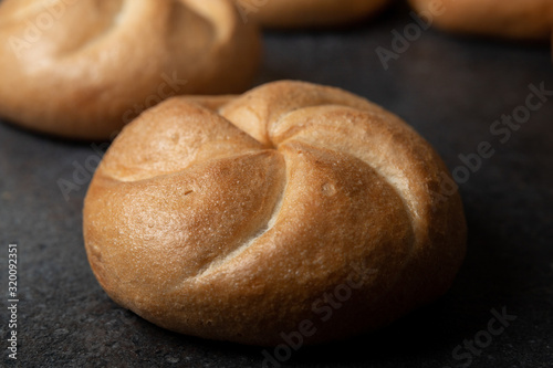 Crusty round bread rolls, known as Kaiser or Vienna rolls