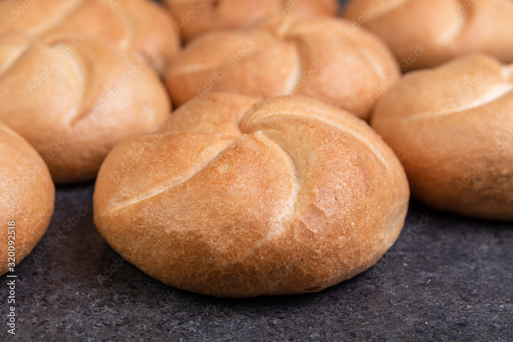 Crusty round bread rolls, known as Kaiser or Vienna rolls