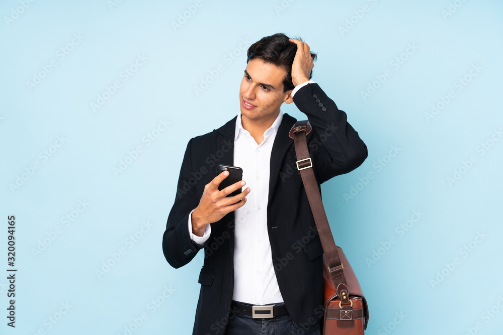 Businessman over isolated blue background laughing Businessman over isolated blue background laughing