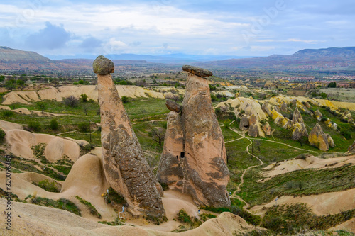 Fabulous landscape with unusual mountain formations. Three Sisters Rocks in Turkish Cappadocia
