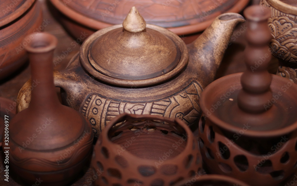 ceramic tableware. Brown clay teapot
