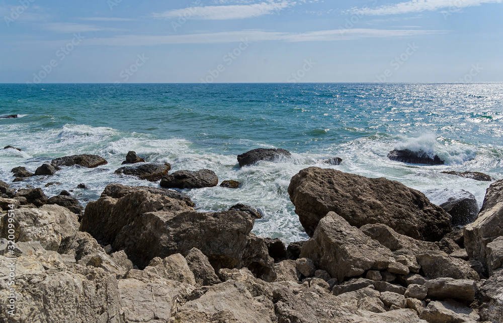Strong surf on the rocky seashore. Crimea