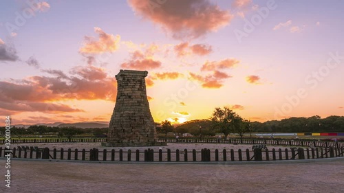 Time lapse sunrise at Cheomseongdae the oldest astronomical observatory in Gyeongju, South Korea photo