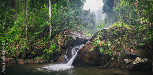 Beautiful waterfall in deep forest at Khao Lak-Lam Ru National Park, Phang-nga, Thailand.