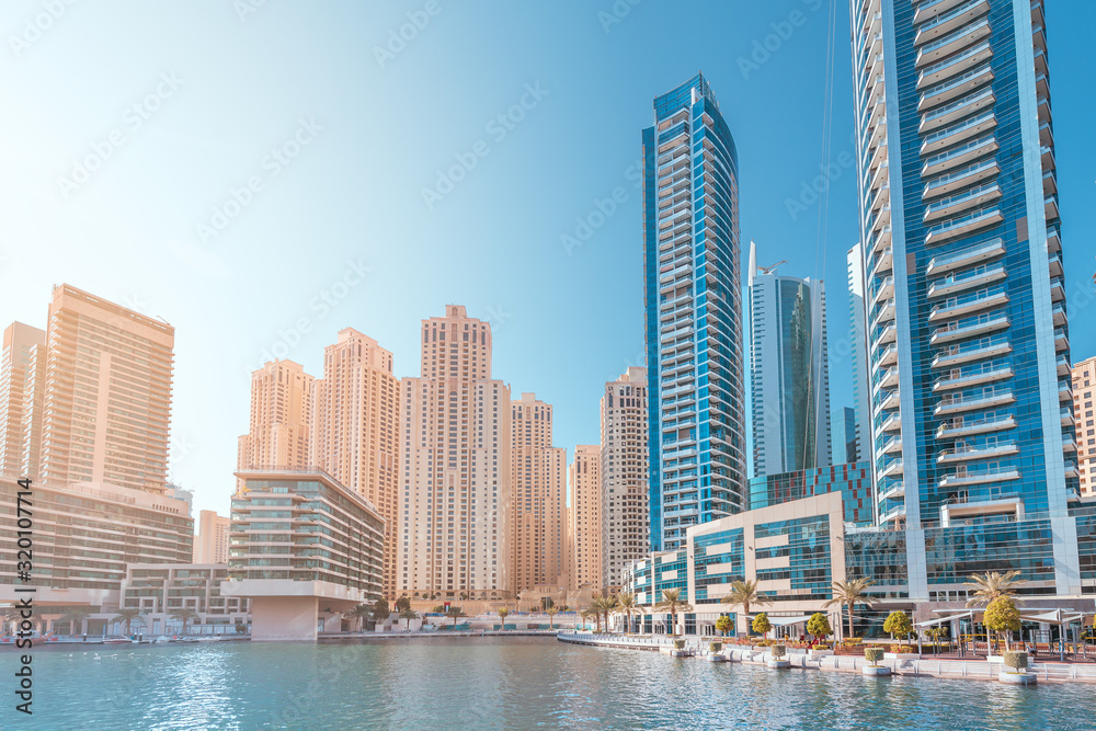 Panoramic view of the Marina district with numerous residential skyscrapers and hotels. Travel destinations in the UAE concept Panoramic view of the Marina district with numerous residential skyscrapers and hotels. Travel destinations in the UAE concept