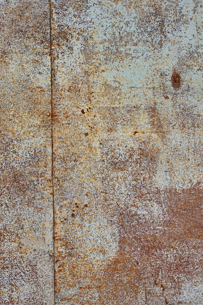 Brown worn, scratched, rusty metal background textures. Grunge, abstraction, design. Space for text. Vertical. Brown worn, scratched, rusty metal background textures. Grunge, abstraction, design. Space for text. Vertical.