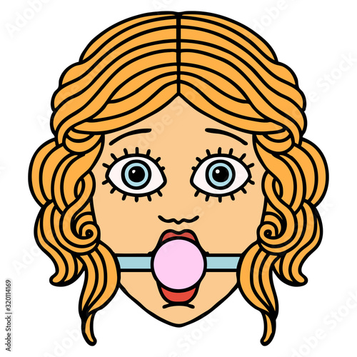 traditional tattoo of female face with ball gag
