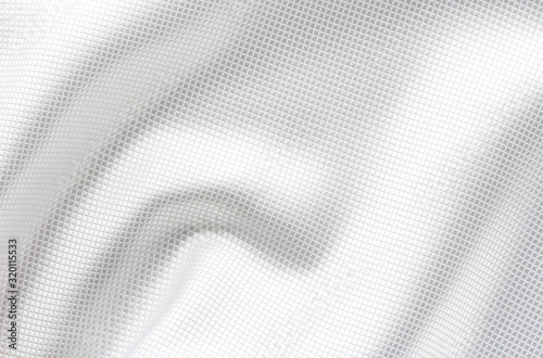 white satin jacquard fabric with large folds photo