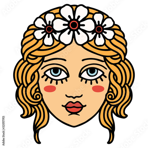 traditional tattoo of female face with crown of flowers
