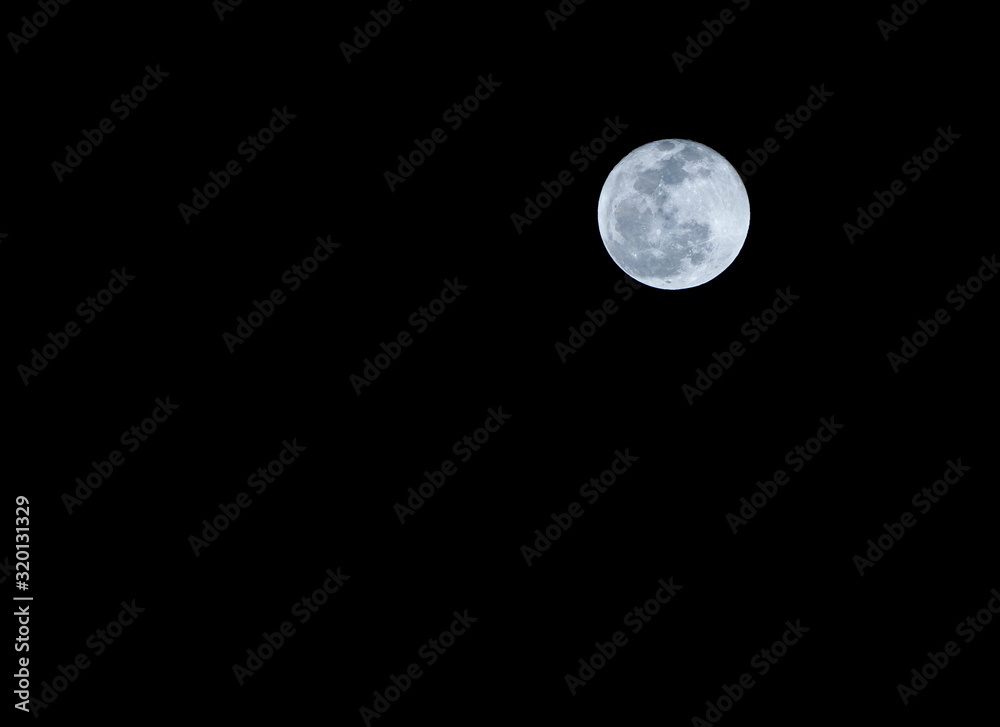 the full moon close up with blue tone the full moon close up with blue tone