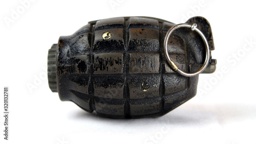 British No.36 Grenade 'Mills Bomb' 1915, it was the last in a series of improved models and was introduced in 1917, this was used in WW1 & WW2 and stayed in service with British Army until 1972