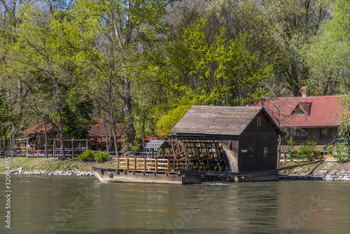 Unique Traditional Boat Mill On A River photo