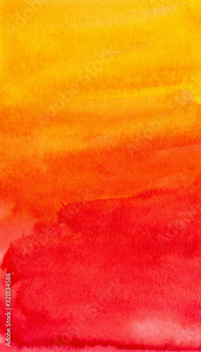 A bright watercolor picture made with yellow, orange and red paints. Can be used as a background or a texture.