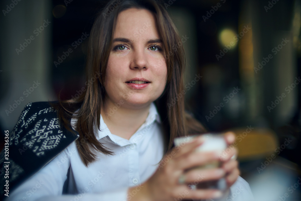 Young woman in a cafe