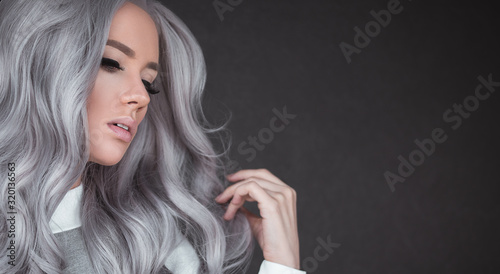 Beautiful girl with healthy long grey hair photo