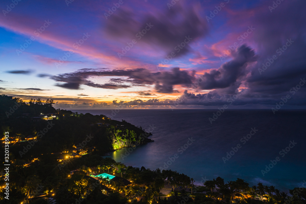 Pink Sunset in Petit Anse bay in Mahe Island Seychelles 