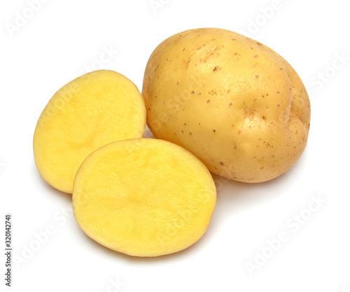 Young potato and slice isolated on white background. Harvest new. Perfectly retouched, full depth of field on the photo. Flat lay, top view