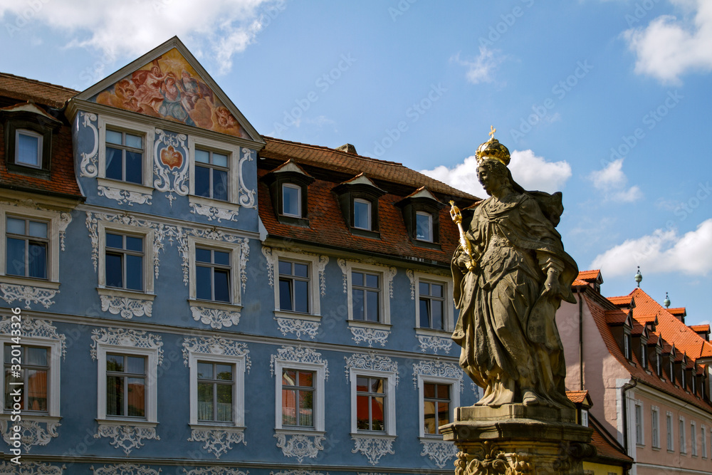 BAMBERG. GERMANY. On  september 14 2019. Statue of St. Kunigunde at the bridge to the Old Townhall at the Regnitz river. built 1750 from Johann Peter Benkert. Bamberg, Germany.