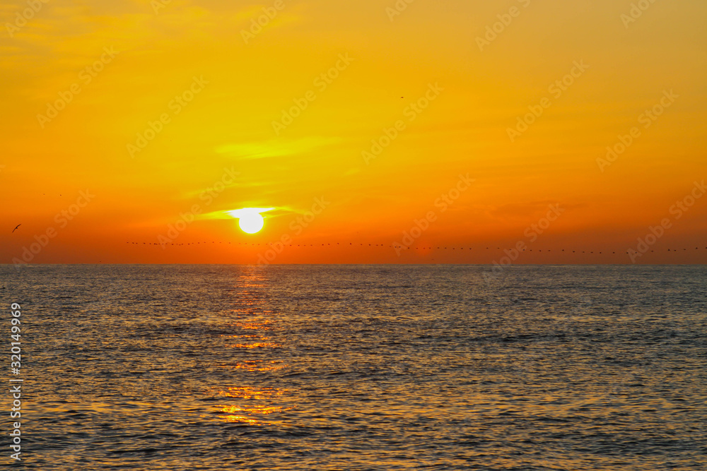 bright beautiful orange sunrise on the sea, sunrise on the sea