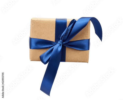 rectangle box wrapped in brown kraft paper and tied with a silk blue ribbon