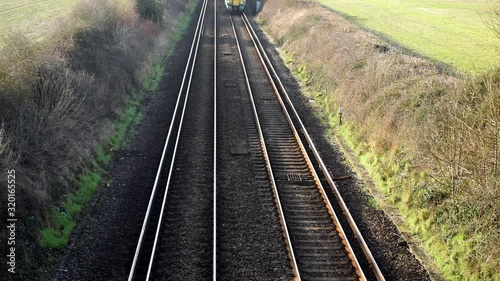 Oving, West Sussex, UK, February 01, 2020. Southern Class 377 train approaching a bridge at Oving.