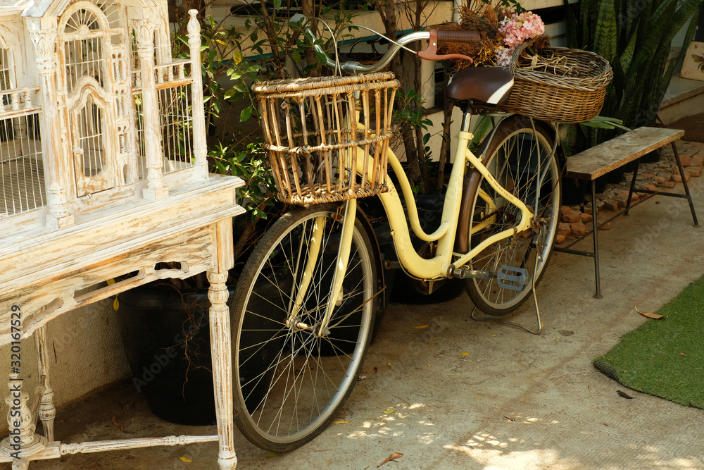 Yellow vintage bicycle in a cafe
