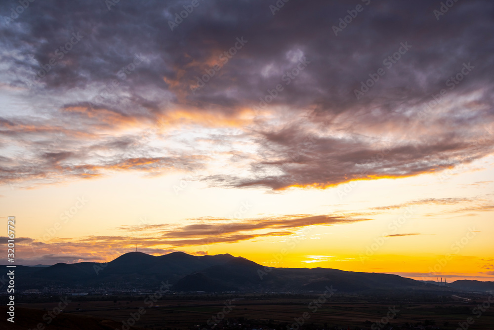 Fototapeta premium Sunset landscape on the hill