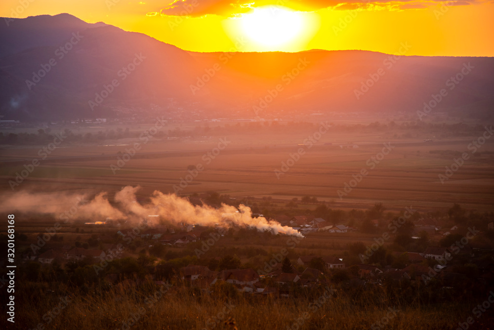 Obraz premium Landscape on the hill at the sunset