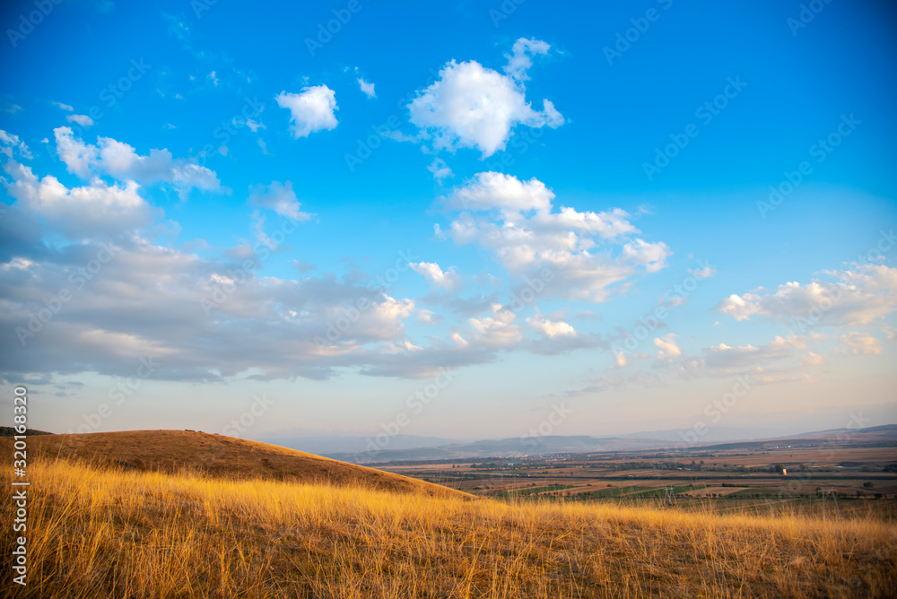 Landscape on the hill at the sunset