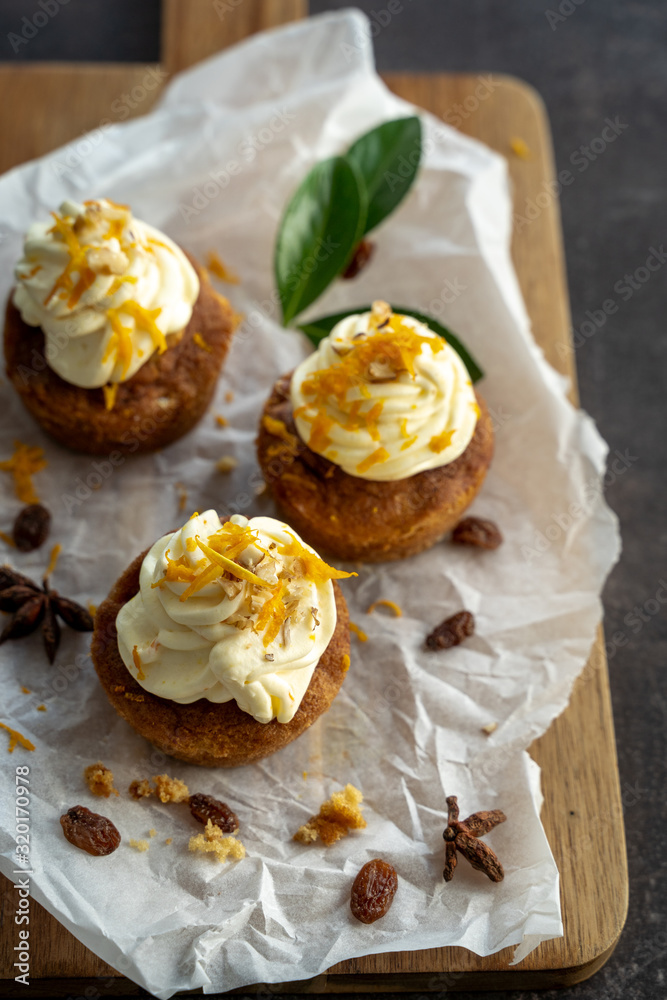 carrot cake cupcake bite size dessert snack homemade baked dessert cream orange peel decoration board composition cafe bistro