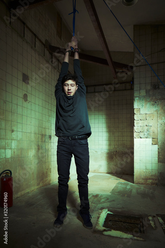 Violent kidnapper have bonded hanging young man under control
