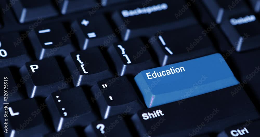 Close up of human hand pressing an Education button with blue color on the computer keyboard. Shot in 4k resolution Close up of human hand pressing an Education button with blue color on the computer keyboard. Shot in 4k resolution