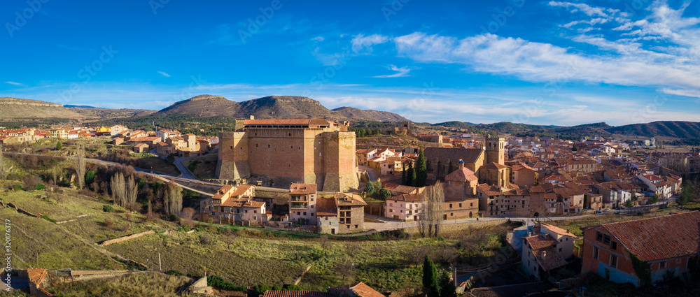 Aerial view of Mora de Rubielos town with medieval Gothic castle and city walls in Teruel Spain