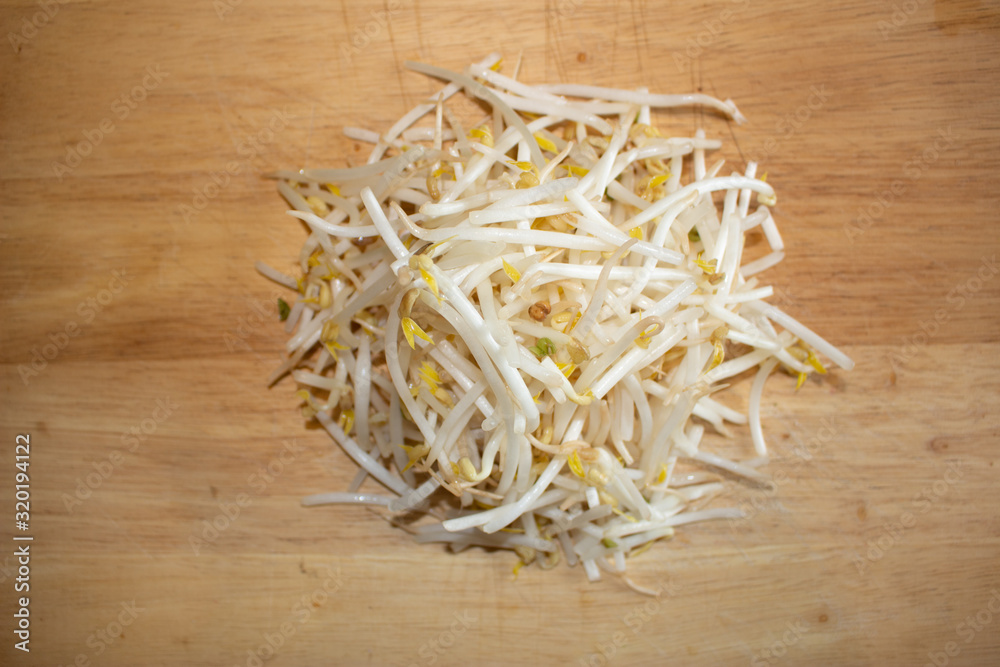 Fresh bean sprout on a wood board