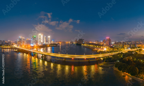 Night view of CBD on the North Bank of Min River, Fujian Province, China © Weiming