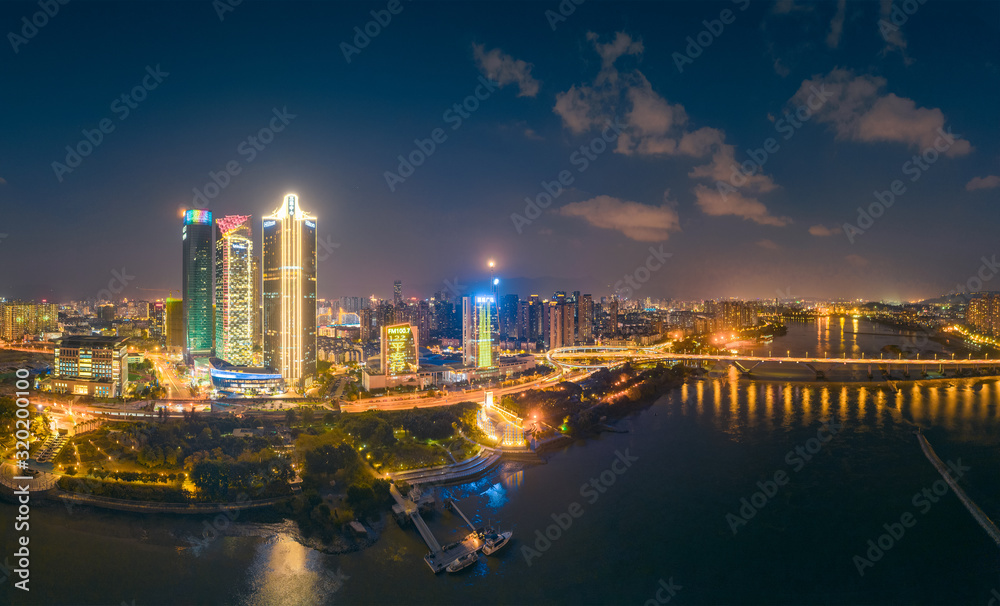 Obraz premium Night view of CBD on the North Bank of Min River, Fujian Province, China
