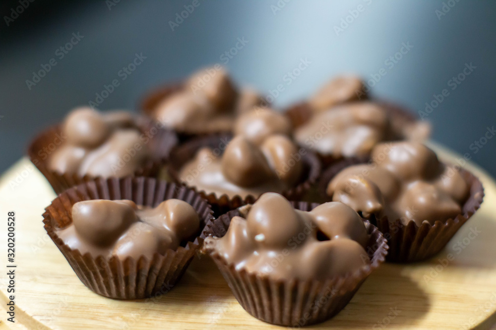 chocolate praline with mixed nut background chocolate praline with mixed nut background
