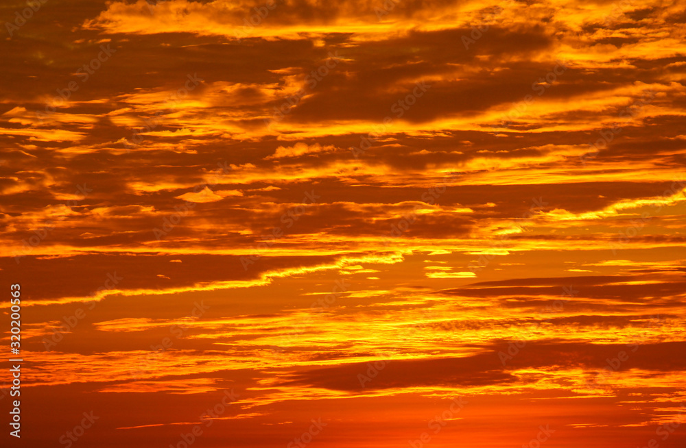 Fiery golden sunset over the ocean
