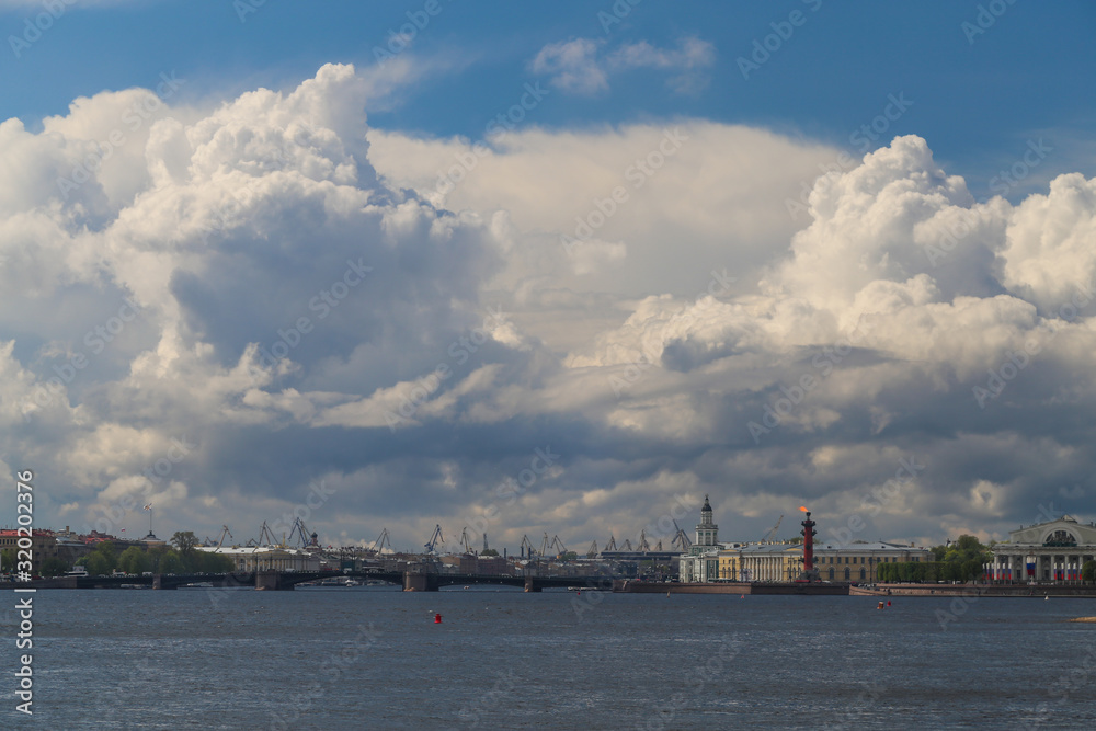 The cloudy sky above the Peter and Paul Fortress in St. Petersburg